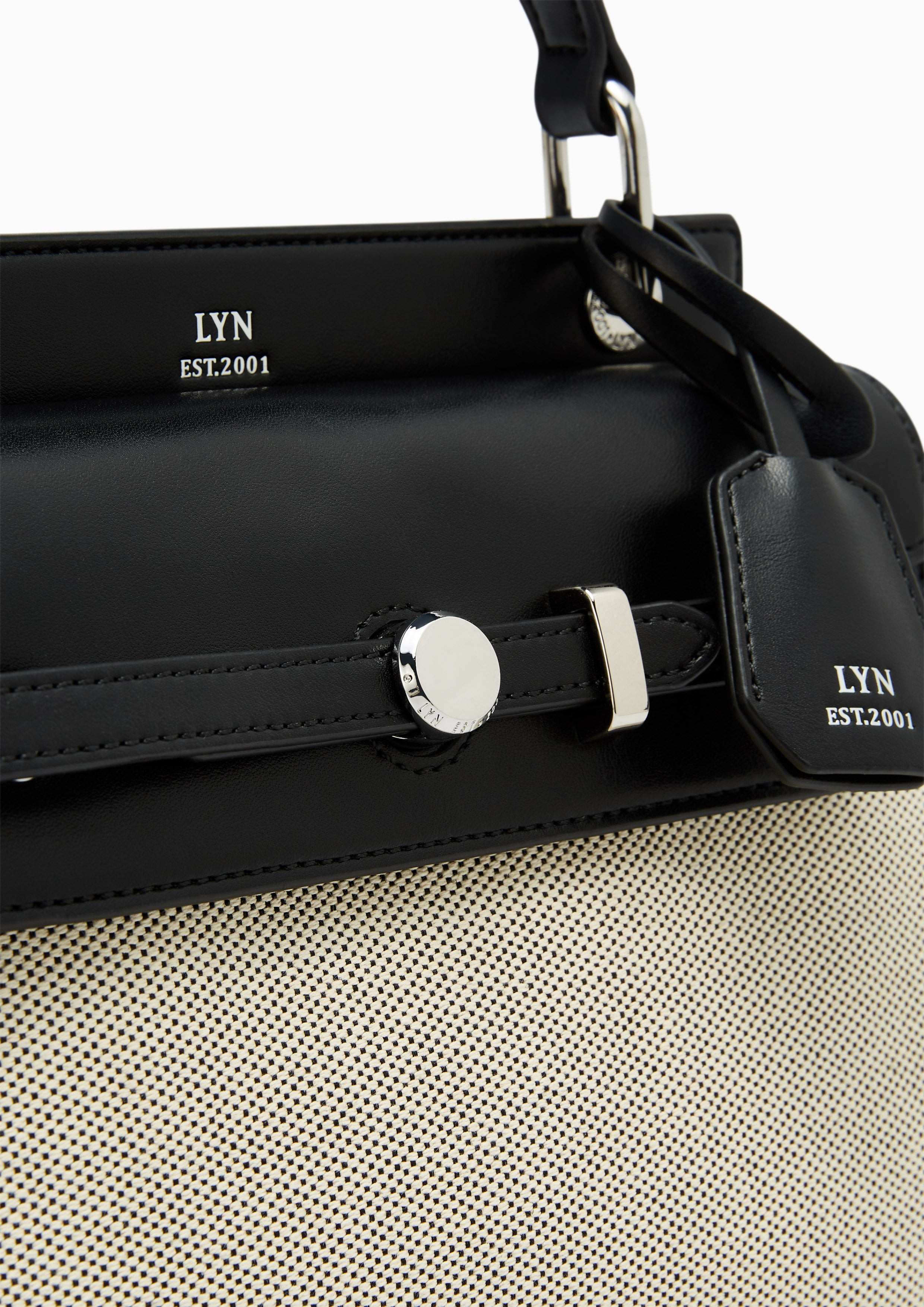 กระเป๋าถือ Re-Edit Anderson Ease M