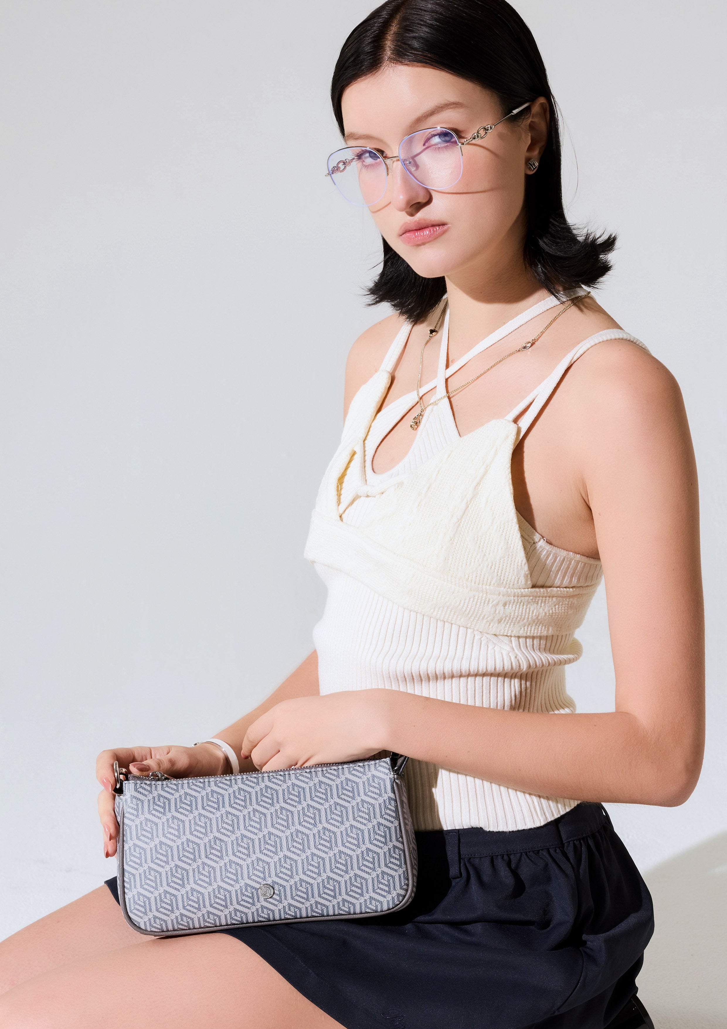 Zoll Infinite Zip Pouch Crossbody Bag Grey