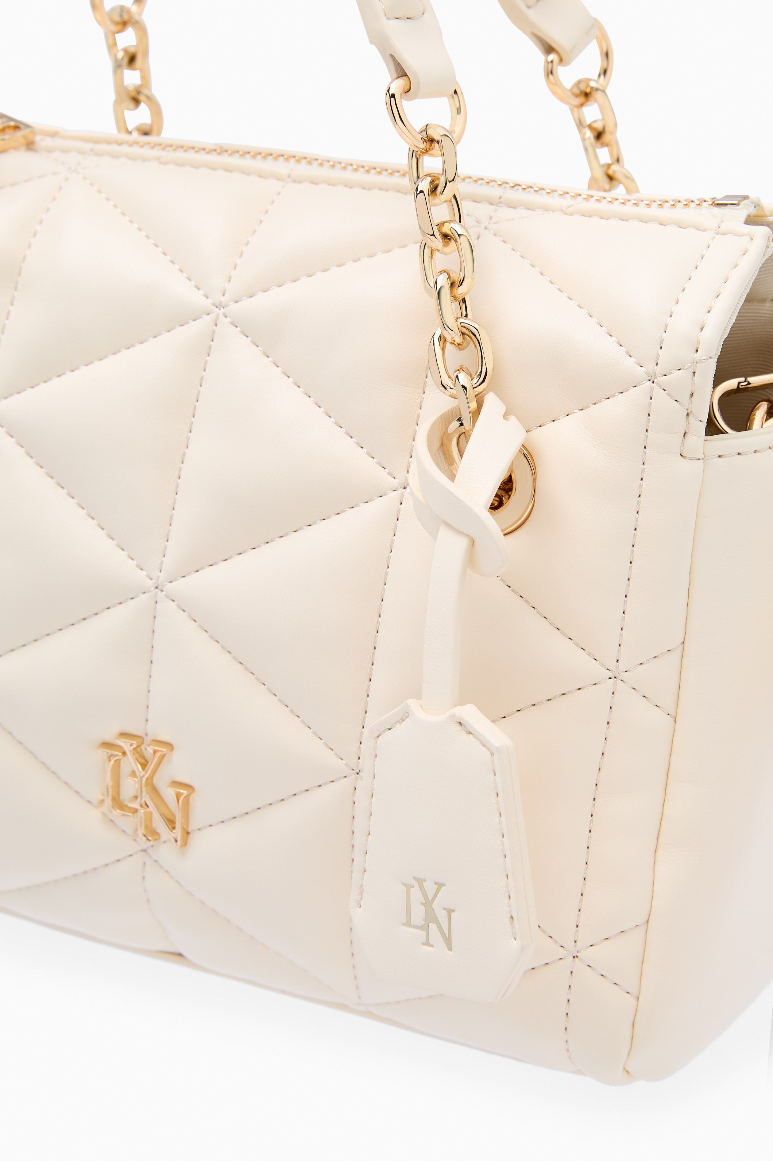 กระเป๋าถือ Tress XS