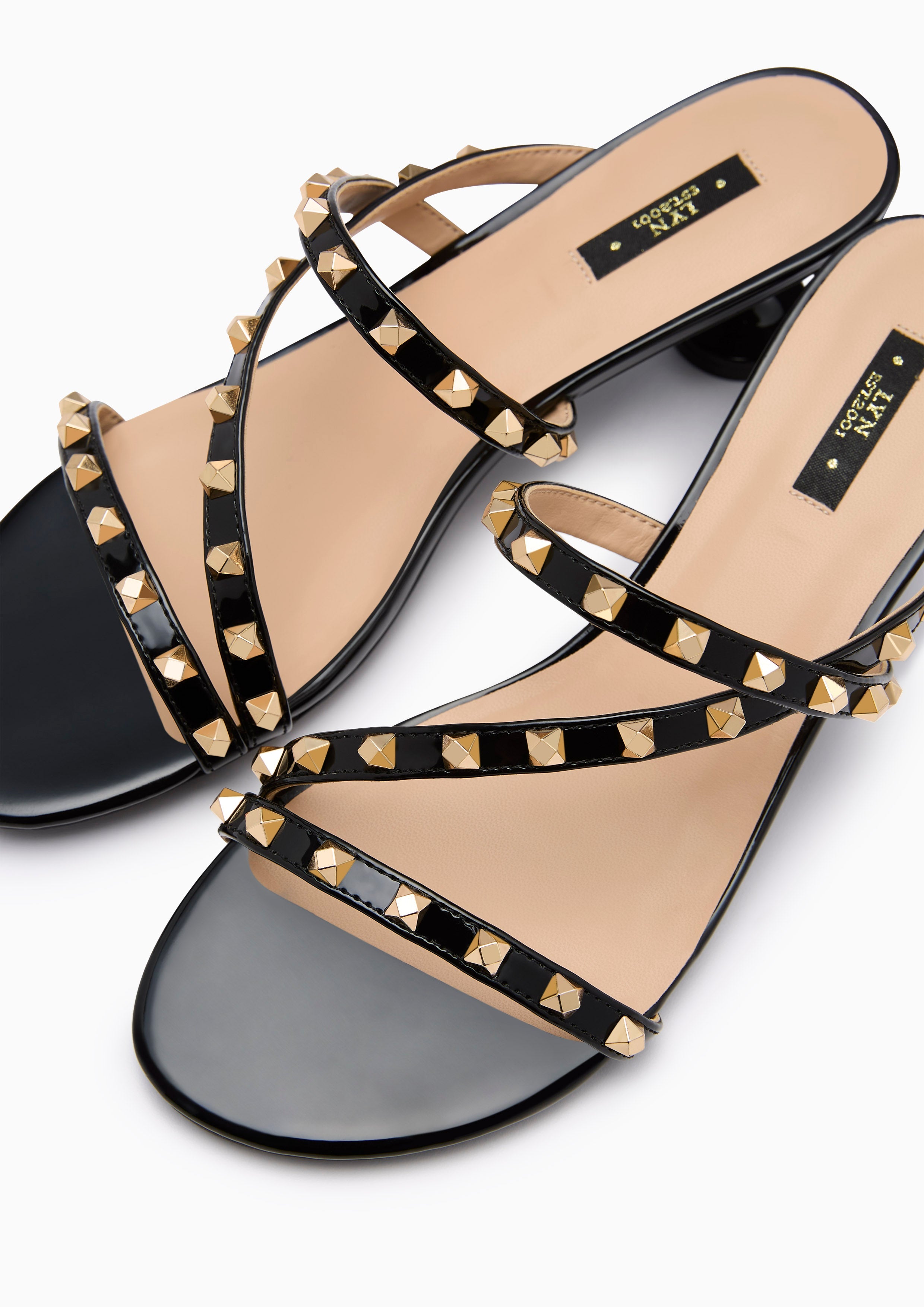 Linda Cross Heel Sandal Black