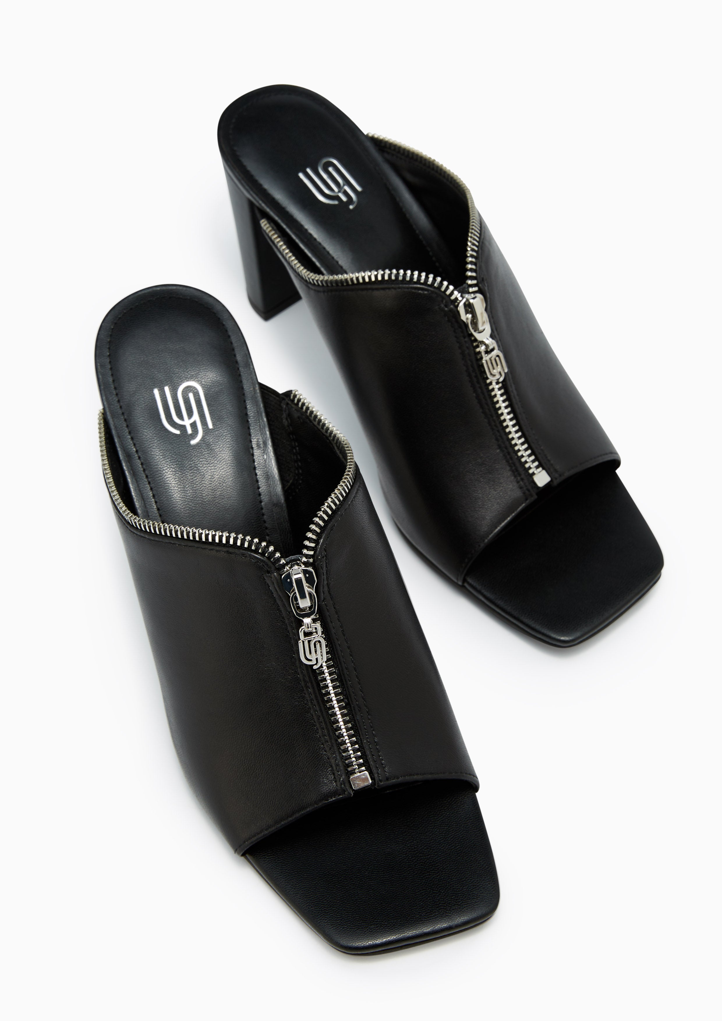 Jayden Infinite Zip Detail Mules Black