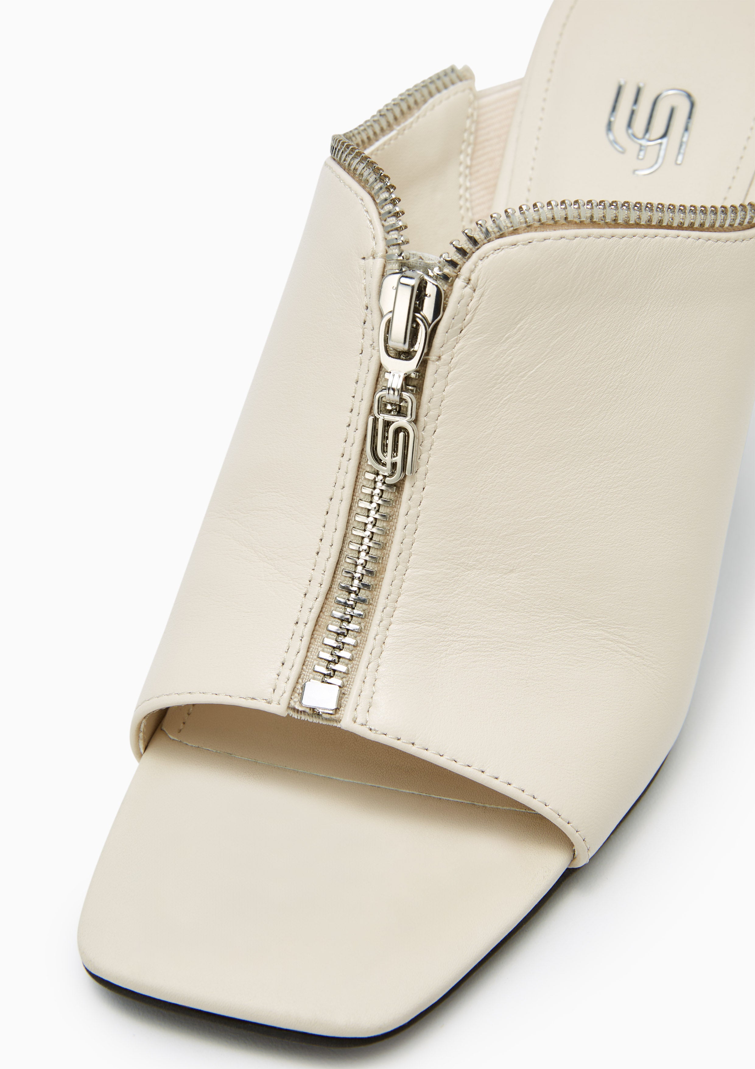 Jayden Infinite Zip Detail Mules White