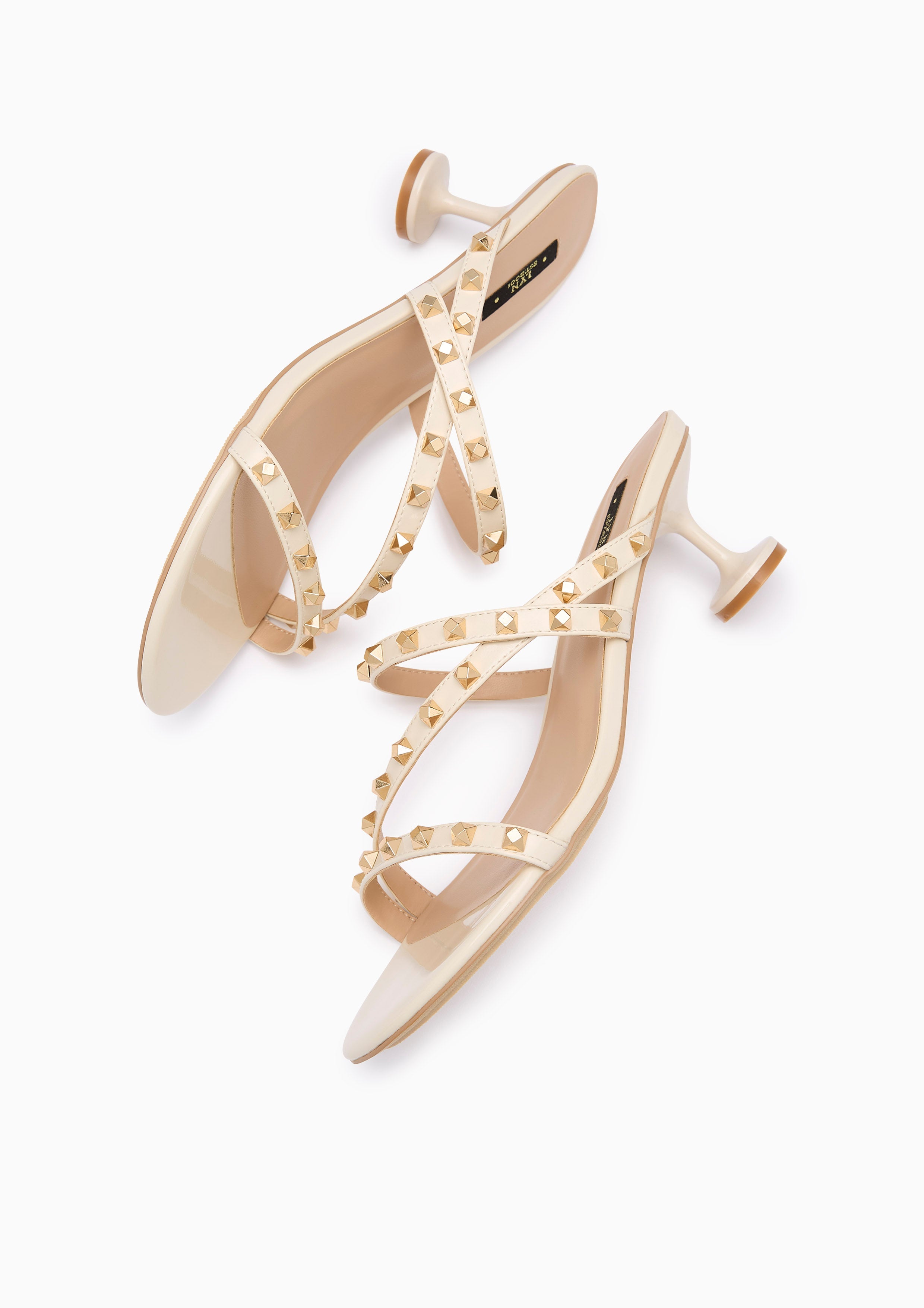 Linda Cross Heel Sandal Ivory