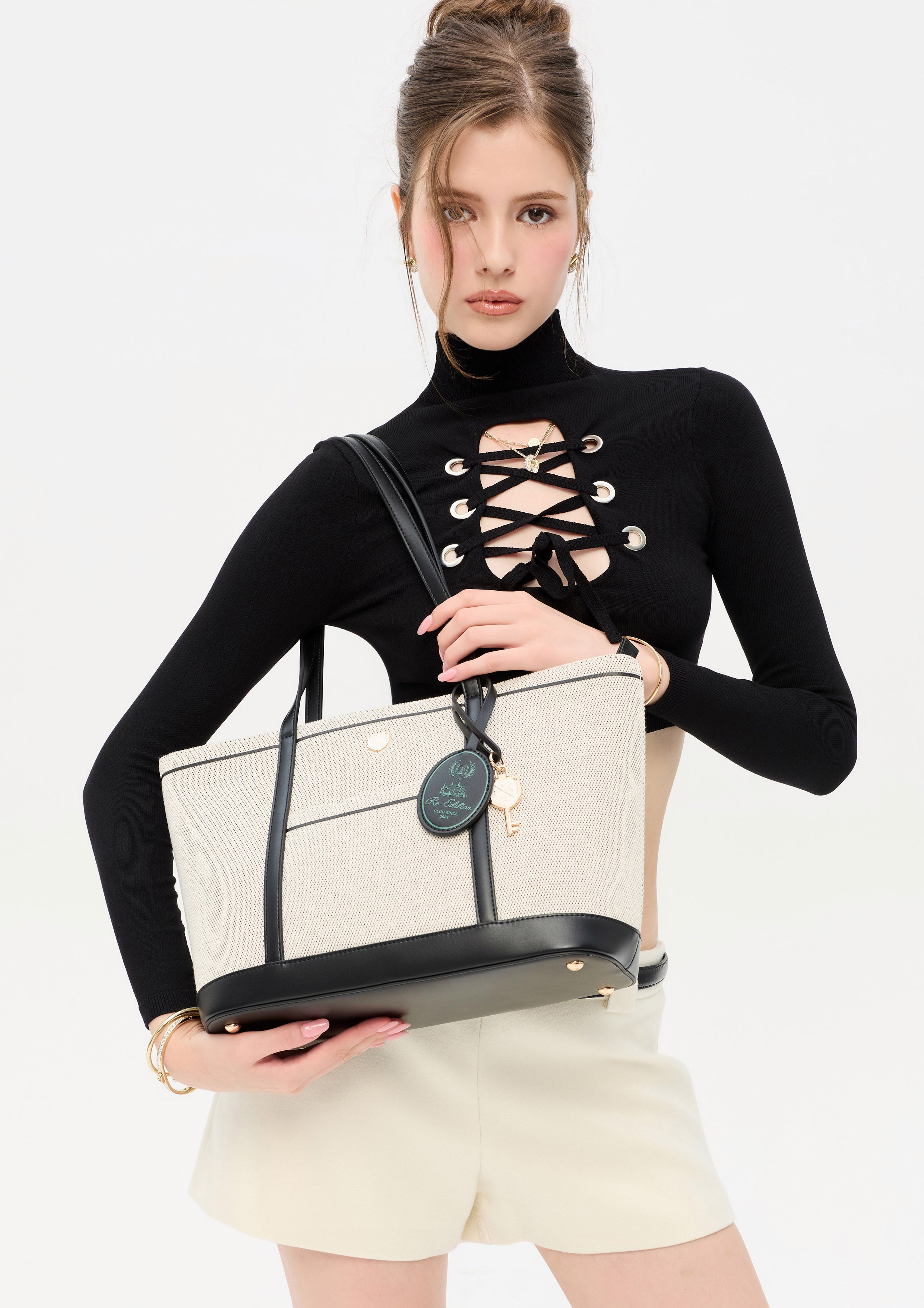Carina Racquet L Bucket Bag Black