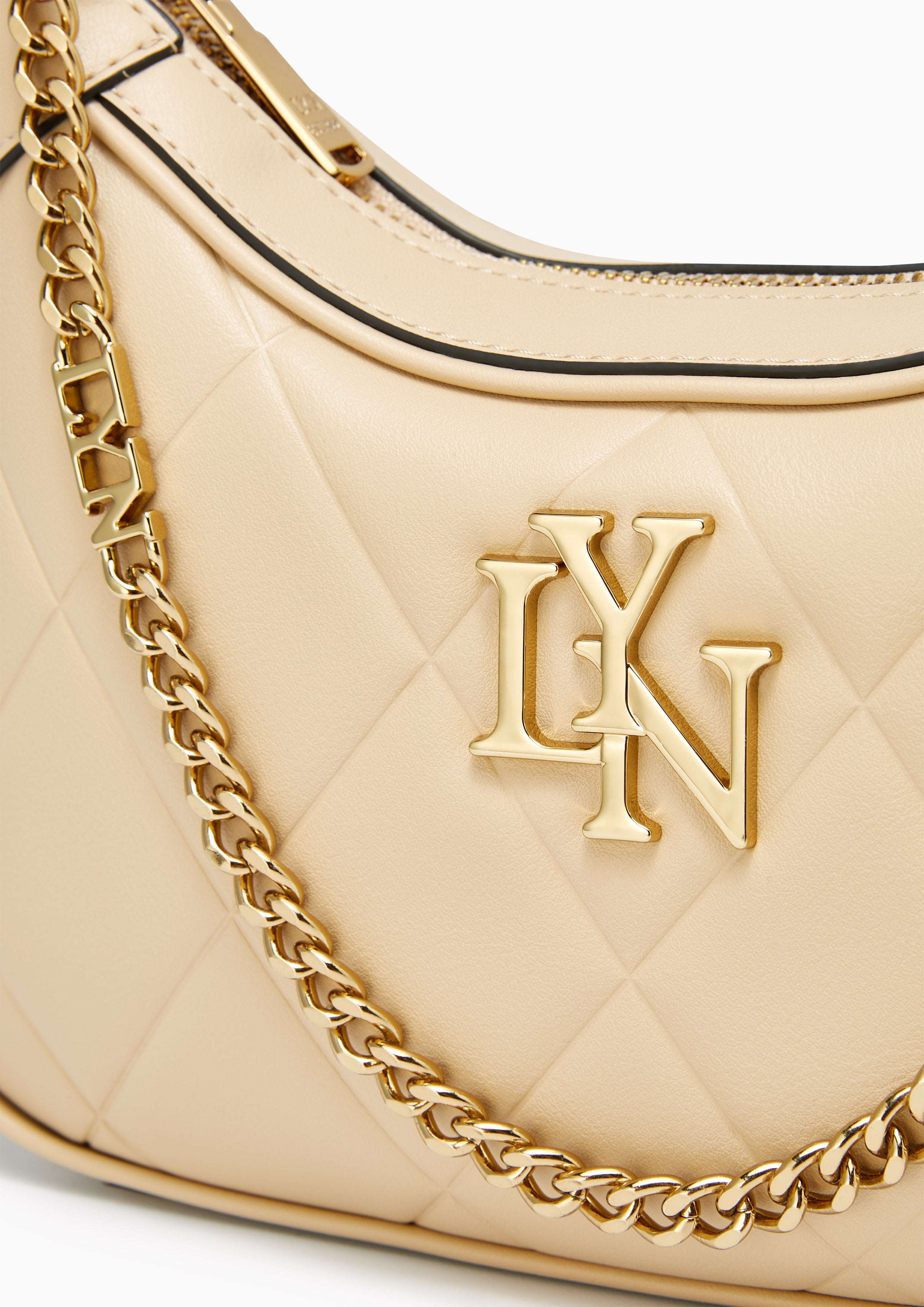 กระเป๋าสะพายไหล่ใบเล็ก Rexha