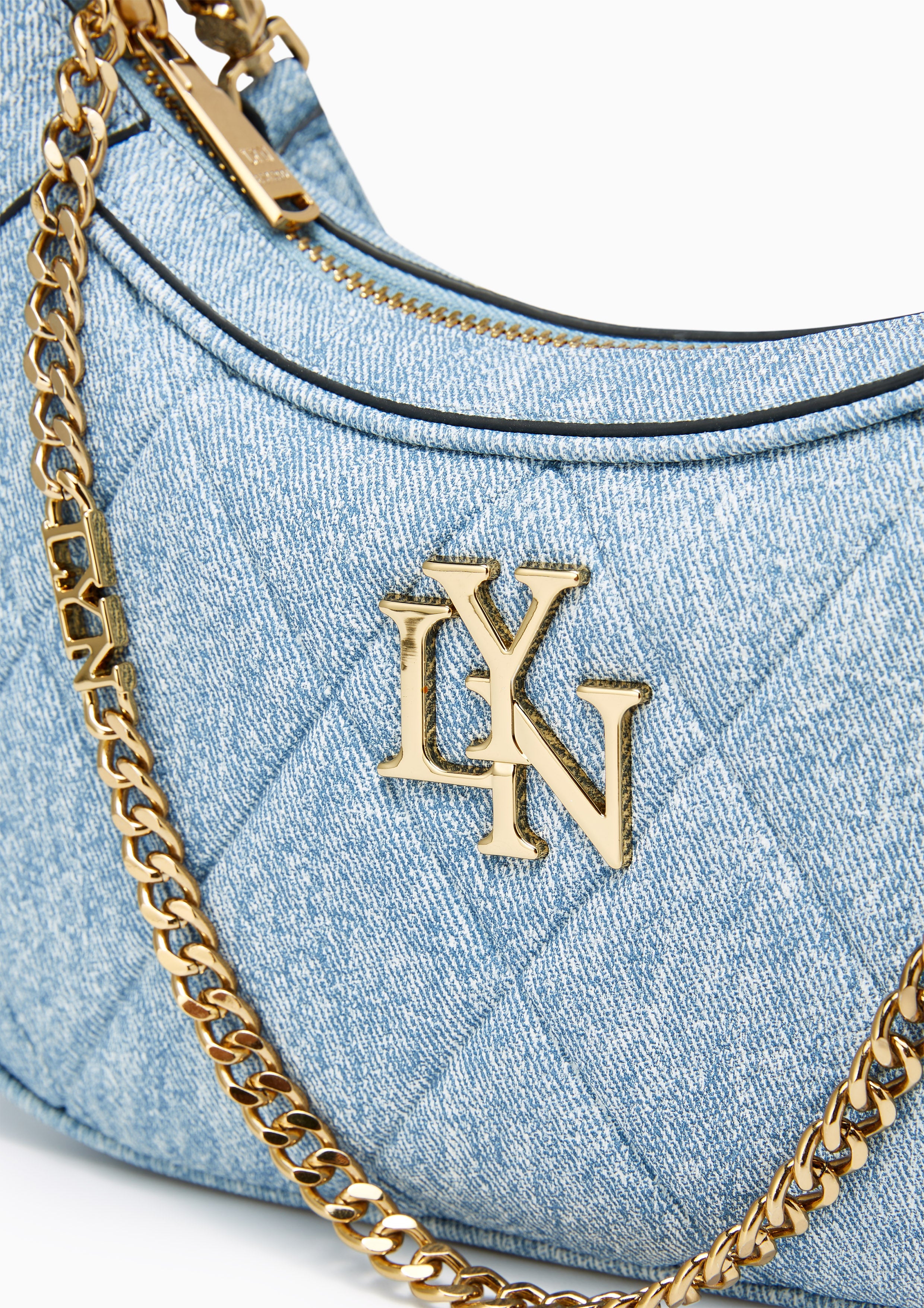 กระเป๋าสะพายไหล่ใบเล็ก Rexha